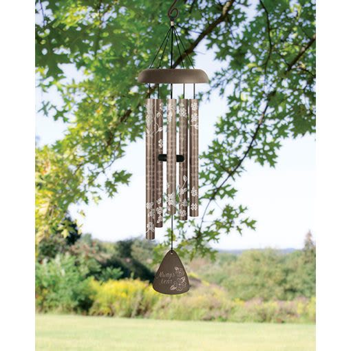 "Always Near" 30" Silhouette Sonnet Chime 63237 - “Always Near” windchime is a beautiful gift of comfort, remembrance, encouragement, and reflection designed to bring peace and gentle sound to any space. Featuring the heartfelt sentiment, “Those we love don’t go away, they walk beside us every day,” this elegant windchime is perfect for memorial gifts, sympathy gestures, remembrance gardens, porches, patios, outdoor living spaces, encouragement gifts, and meaningful everyday décor.  Each windchime includes a coordinating bow and may be upgraded with a temporary display stand for services, churches, celebrations of life, events, or special gatherings. A premium fresh flower spray upgrade is also available for an even more personalized presentation.  Its timeless design and soothing tones create a peaceful atmosphere while honoring memories, celebrating life, and bringing comfort throughout the seasons. Many customers choose memorial windchimes as lasting keepsakes, garden accents, bereavement gifts, inspirational décor, or thoughtful gifts for family and friends.  Aspen Tower Florist proudly offers local delivery in Greensburg, Indiana and surrounding communities including Batesville, Shelbyville, Rushville, Westport, Hope, North Vernon, and nearby funeral homes, churches, homes, cemeteries, businesses, and care facilities.  63237