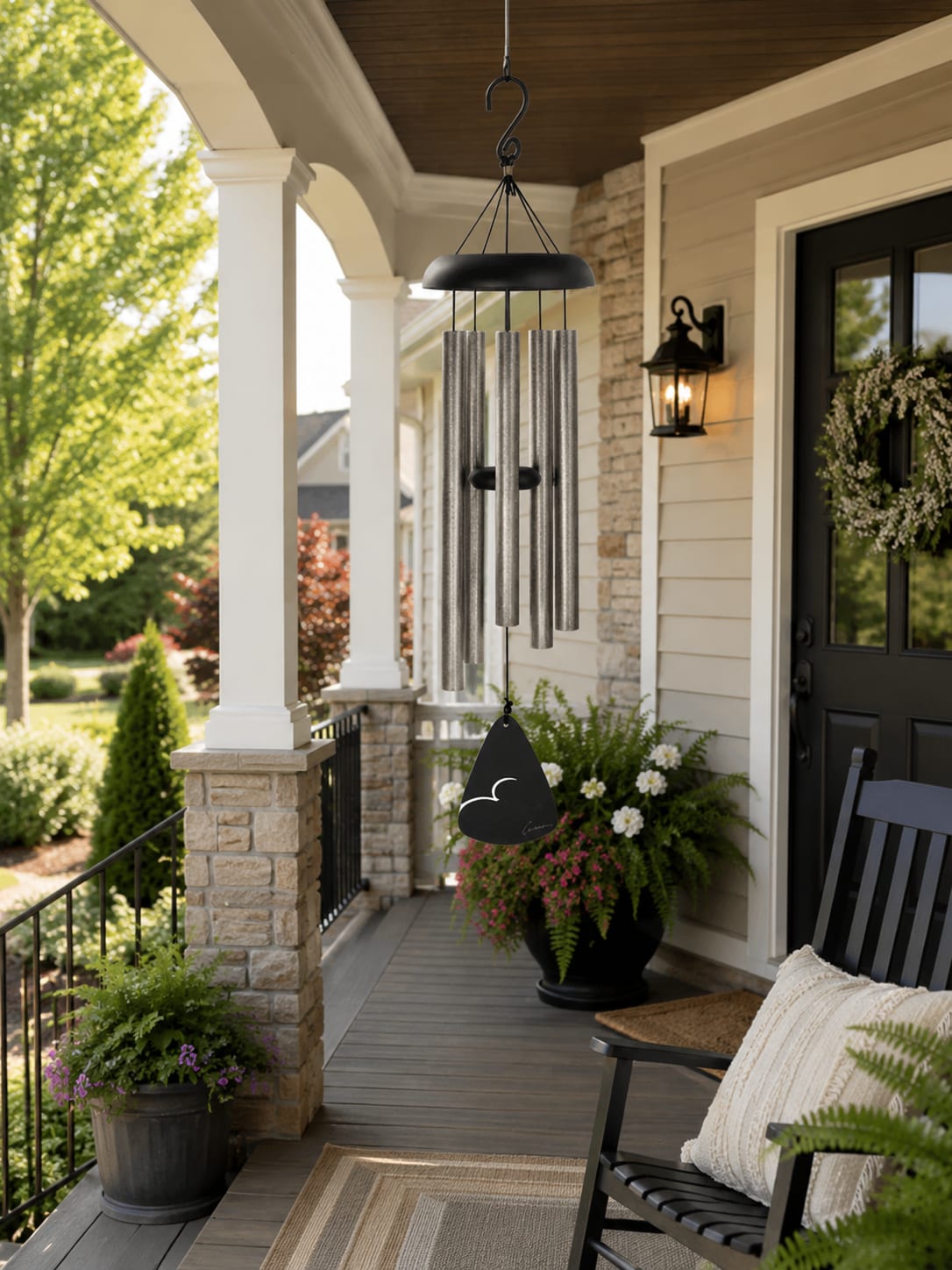 Pewter Fleck 30" Windchime 60230 - Powder-coated aluminum wind chimes make a timeless gift for birthdays, anniversaries, retirement, Mother’s Day, holidays, get well wishes, housewarmings, thank-you gifts, thinking of you moments, and sympathy occasions. Designed with elegant styling and soothing resonance, these decorative wind chimes add peaceful sound and lasting beauty to porches, patios, gardens, memorial spaces, and outdoor living areas.  Crafted with durable powder-coated aluminum tubes, each wind chime offers rich tone, weather-resistant finish, and classic style that works beautifully for both everyday gifting and meaningful life events. Their versatile look blends easily with farmhouse, cottage, Victorian, modern, and garden-inspired décor.  Standard presentations include decorative ribbon accents and a coordinating gift box for easy gifting. Deluxe presentations feature display on a temporary leased stand for services, gatherings, or special events with upgraded ribbon styling. Premium presentations add a fresh flower spray and designer ribbon for a fuller, upscale display with added texture and color.  A thoughtful keepsake gift with movement, sound, and visual beauty that can be enjoyed long after the occasion has passed. Perfect for spring, summer, birthdays, celebrations, remembrance gifts, retirement, anniversaries, or simply letting someone know you are thinking of them.
