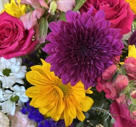 Garden Selection – Fresh Vase Arrangement - Our Garden Selection Vase Arrangement is a one-of-a-kind floral design created with the freshest seasonal blooms available. Handcrafted by our experienced designers, each arrangement showcases a beautiful mix of flowers selected for their quality, color, and lasting beauty. Arranged in a glass vase, it's ready to enjoy the moment it arrives. Because we design each arrangement using the best flowers of the day, every Garden Selection is unique. 