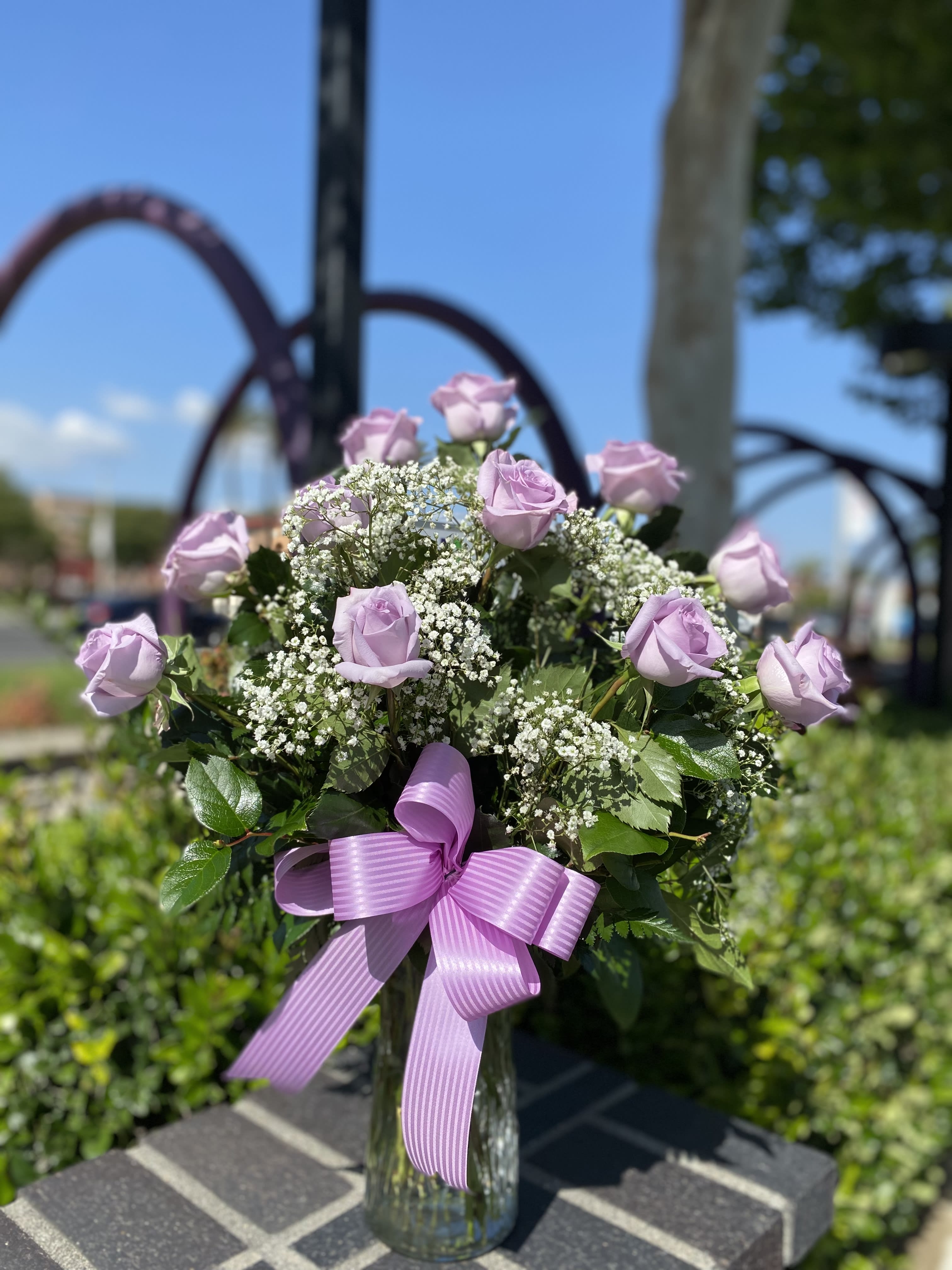 Lavender Wishes - say Mom your the best with lavender twist! A thoughtful selection for the purple-lover in your life, this arrangement of one or two or 3 dozen lavender roses features beautiful eucalyptus and rich green salal. And million star 