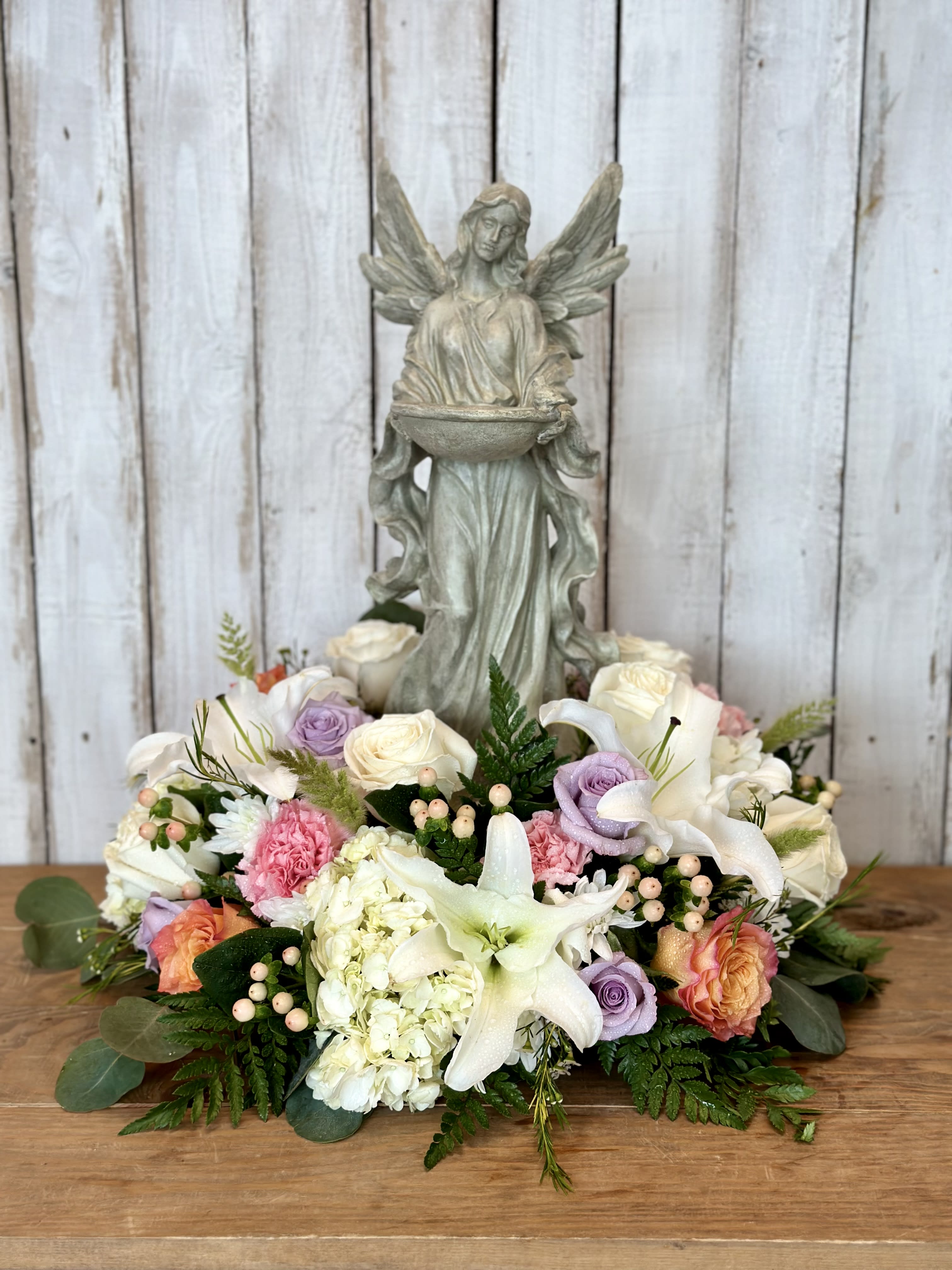 Angel in my garden - This Gorgeous floral arrangement is beautiful. This includes a keepsake garden angel. That can be used as a birdfeeder.