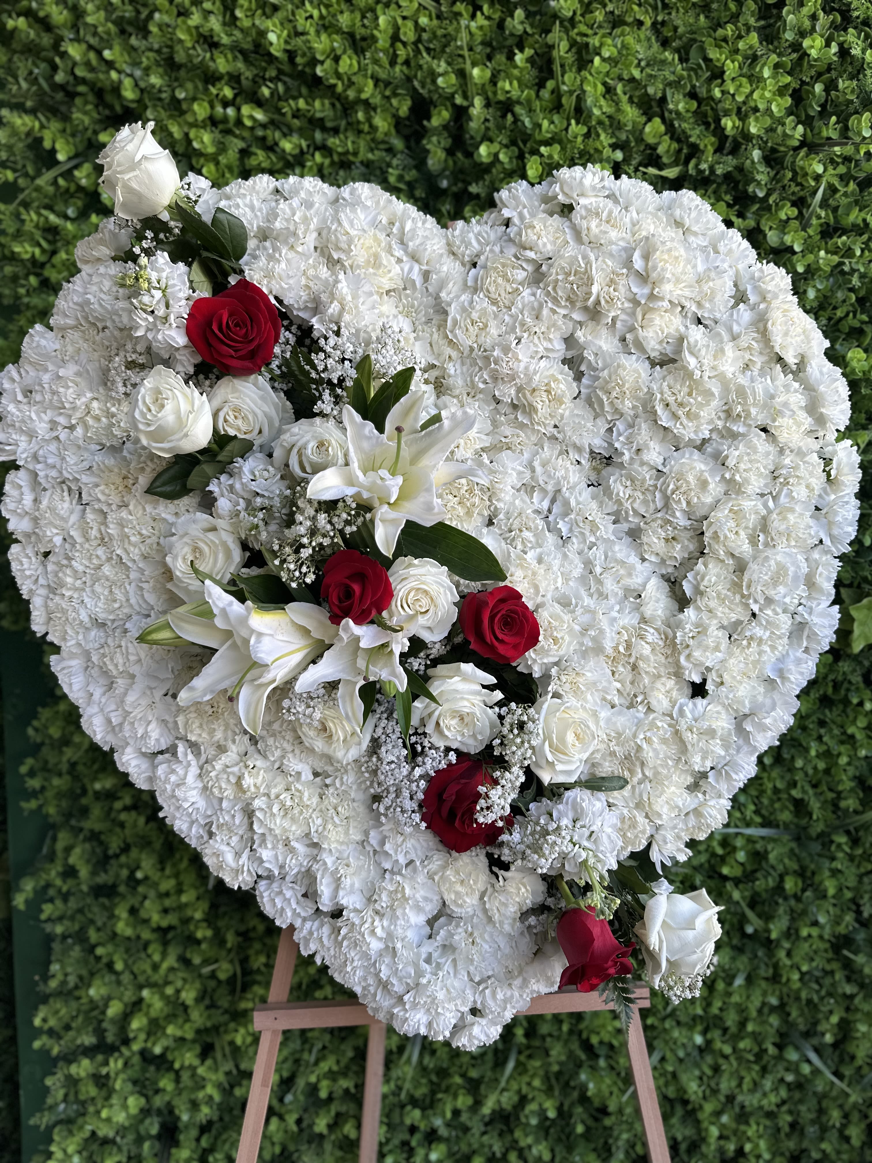 broken heart - All white chrysanthemums carnations Cluster of red White roses and lilies