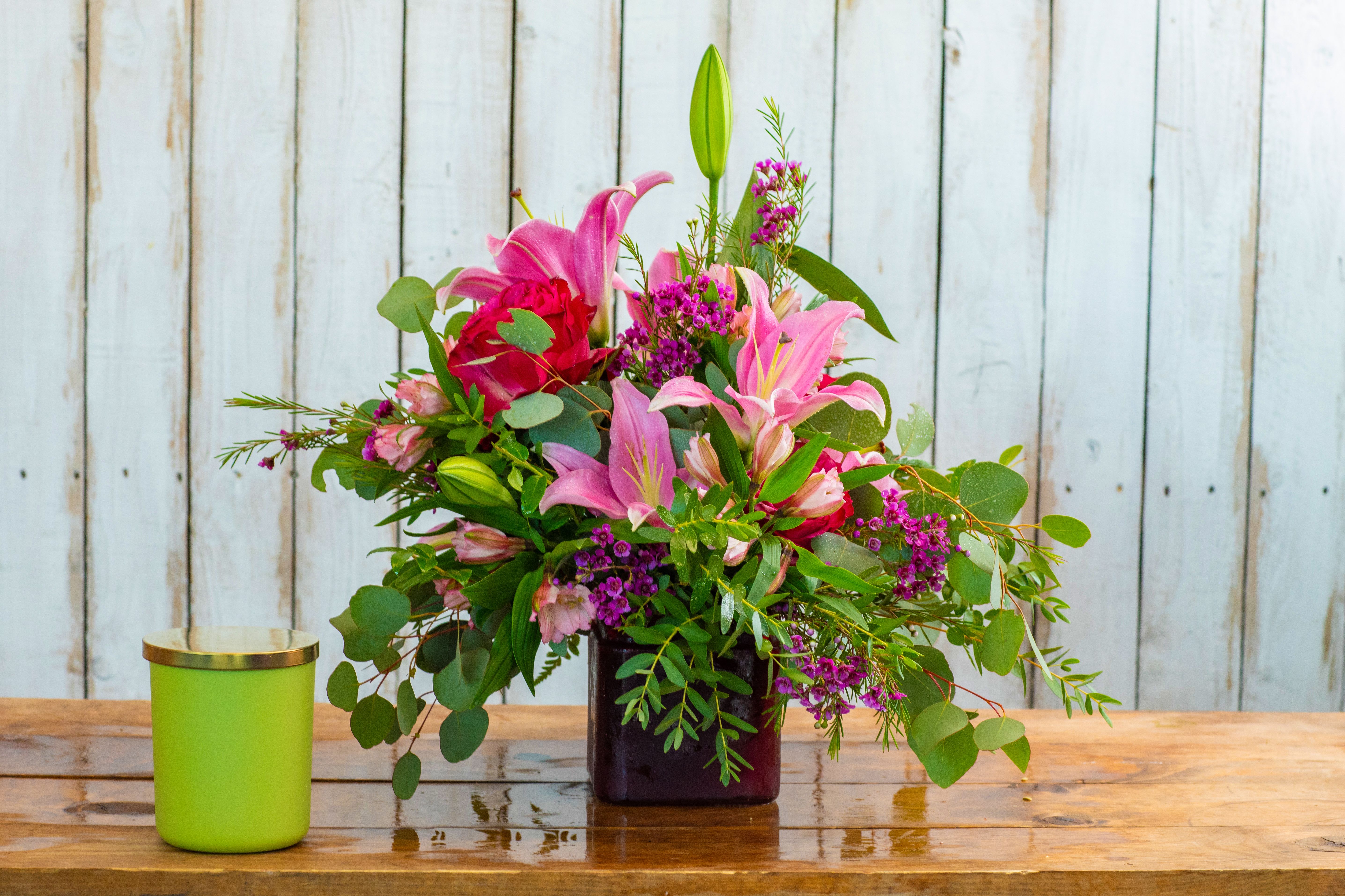 Blush Garden Blooms – Elegant Pink Lily &amp; Rose Arrangement | Rancho Cucamonga Flower Delivery - Soft, romantic, and beautifully lush, our Blush Garden Blooms arrangement is designed with a fresh garden-inspired feel. Featuring elegant pink lilies, vibrant roses, and seasonal accent blooms, this arrangement is full of texture, movement, and natural beauty.  Designed in a modern cube vase with flowing greenery, this piece brings a perfect balance of softness and vibrancy—making it an ideal choice for birthdays, anniversaries, get well wishes, or simply brightening someone’s day.  Each arrangement is thoughtfully handcrafted by our floral designers, ensuring a unique, one-of-a-kind design every time.  Available for same-day flower delivery in Rancho Cucamonga and throughout the Inland Empire, this elegant bouquet is a beautiful way to send love, joy, and a touch of garden-inspired charm. 