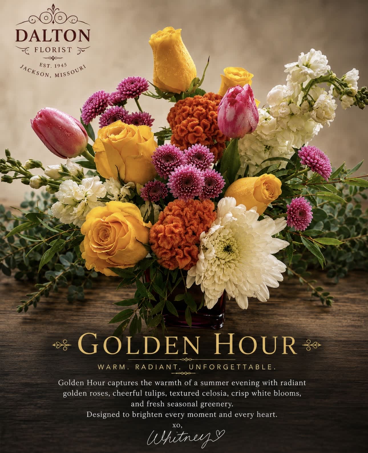 Bouquet of yellow roses, pink tulips, and white blooms in a vase