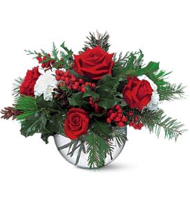Christmas Bubble Bowl - An elegant rose bowl, filled with festive flowers and foliage, makes this the perfect touch to add to any room.  Carnations, roses, cedar, fir and holly arrive in a clear glass rose bowl.  Approximately 14" W x 13" H  Orientation: All-Around  As Shown : TF89-2