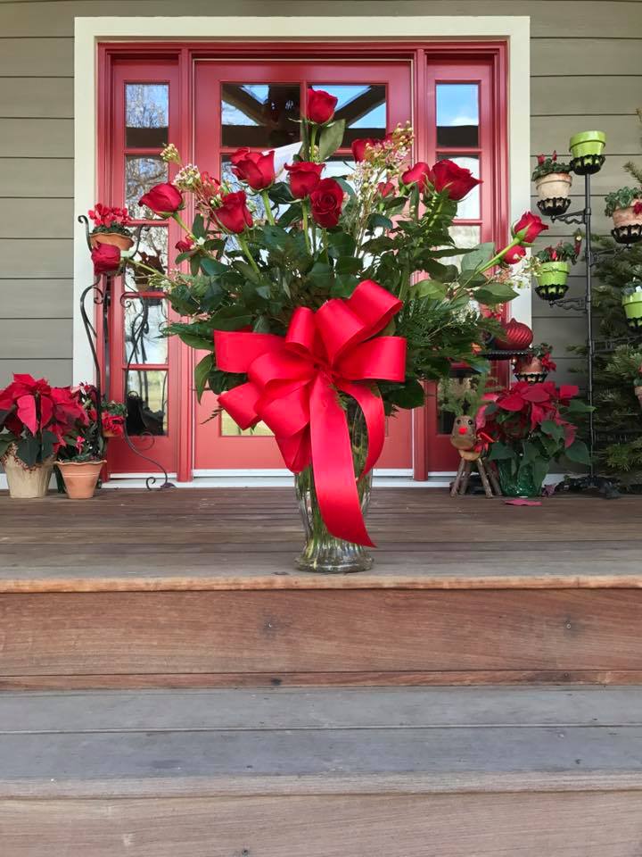 Red Bow  By Flower Carriage  - Two dozen red roses provides the classic romantic gift. It's perfect for Birthday's, Special Occasion, or Anniversary. APPROXIMATE DIMENSIONS: 30" H X 22" W
