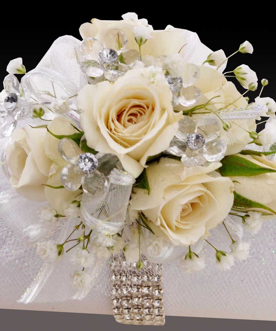 Cream rose bouquet with crystal accents and white ribbon