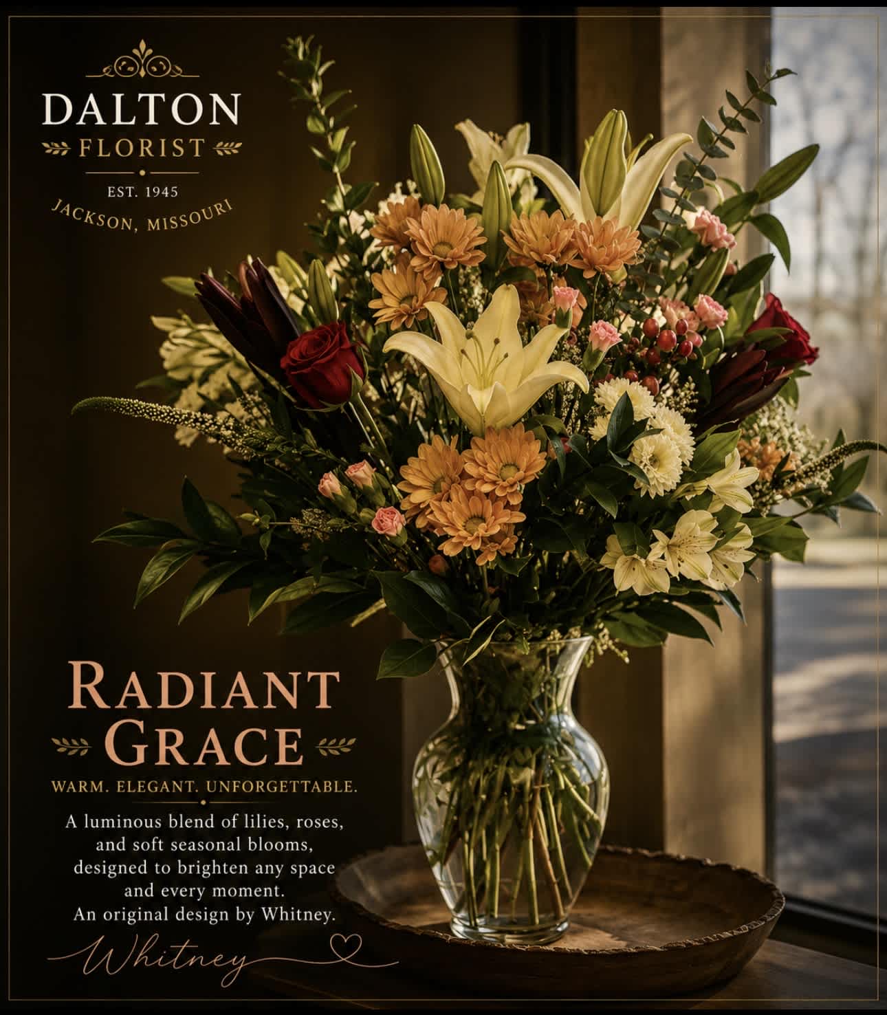Mixed bouquet of lilies, roses, and daisies in a clear glass vase