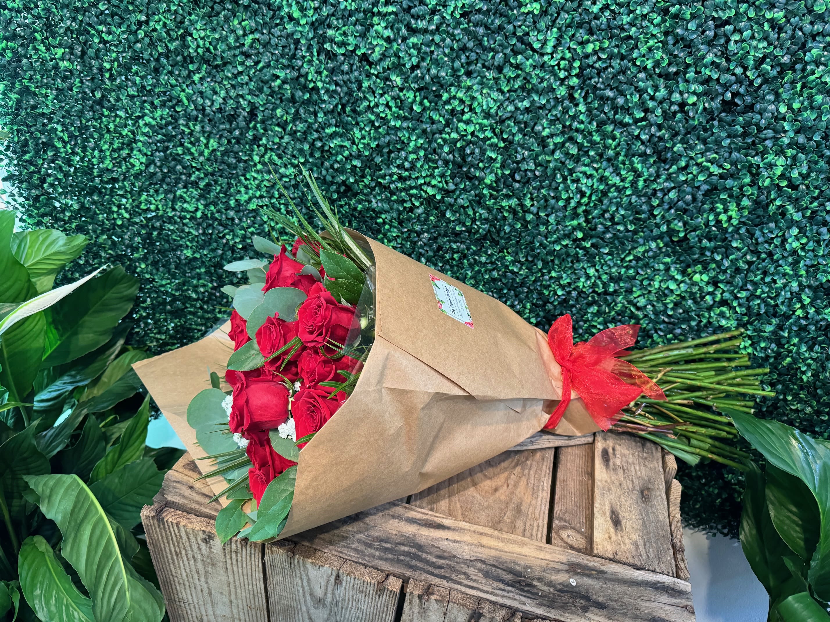 August Rose special - Beautiful 2 Dozen Ecuadorian red roses wrapped in brown paper.   ( Any color)  Please make sure to add to notes what color you like.