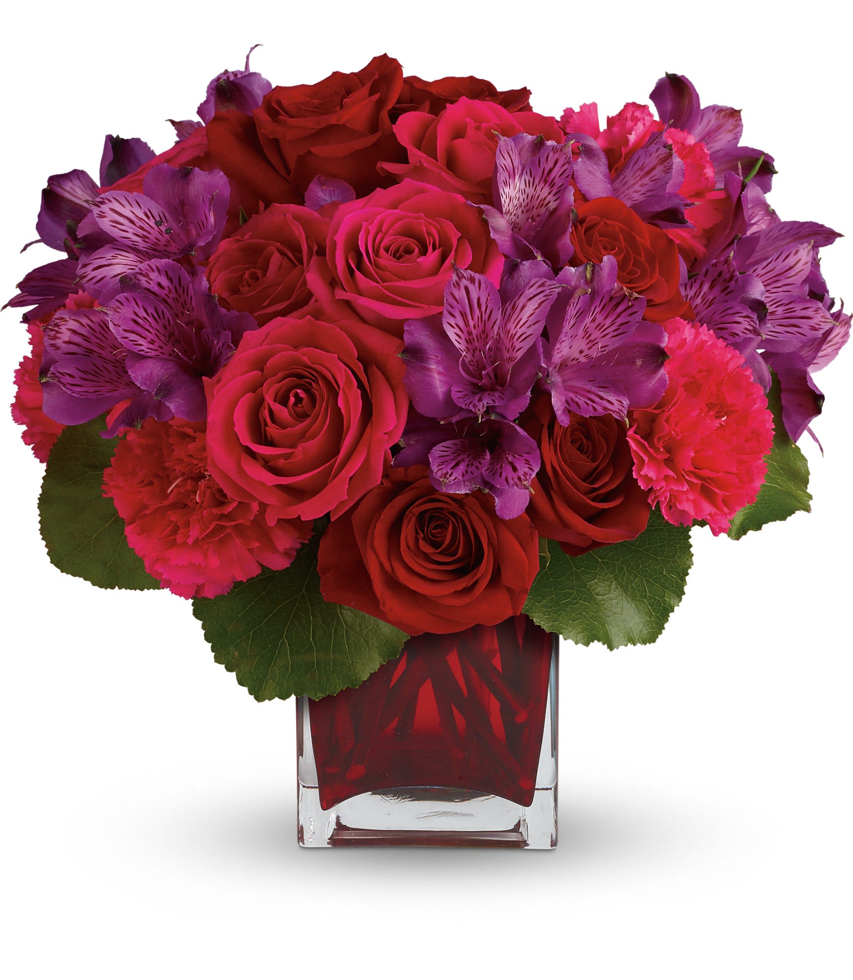 Bouquet of red roses, purple alstroemeria, and pink carnations in a glass vase