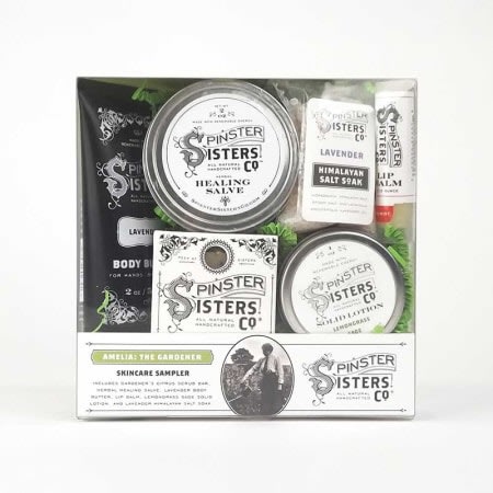 Spinster Sisters' Amelia - The Gardener - Amelia - The Gardener is a perfect sampler for anyone with a green thumb (or anyone who wishes they had a green thumb!). It includes our miraculous Herbal Healing Salve (2 oz. tin), Gardener's Citrus Scrub Bar Bath Soap (2.4 oz. bar), Lemongrass Sage Solid Lotion (1 oz. tin), Lavender Body Butter (2 oz. tube), Lavender Himalayan Salt Soak (1 oz. bag), and Lip Balm (0.15 oz. tube; flavor varies). Use these products after a day in the garden and your hands will thank you!