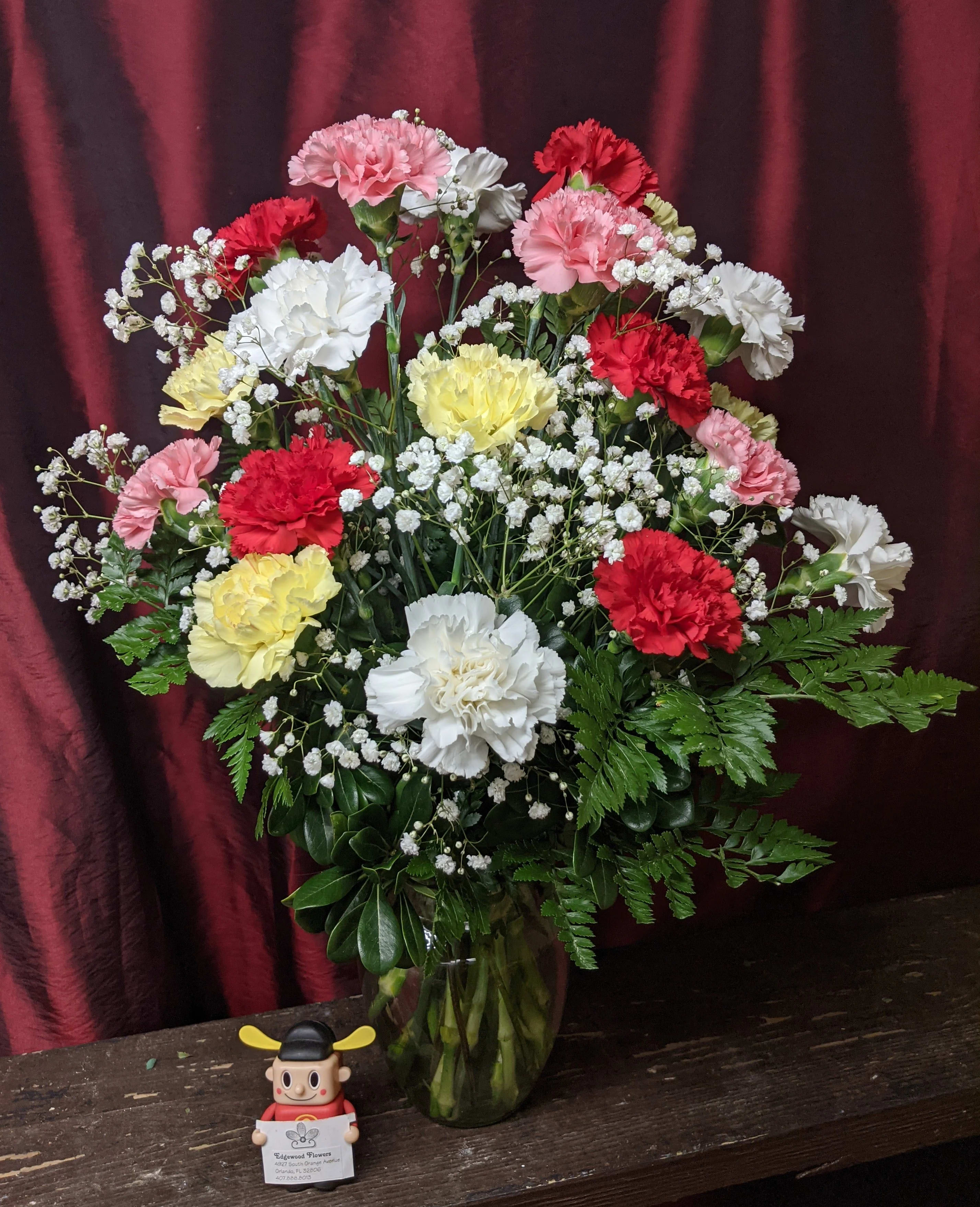 Radiating Love Bouquet  - A bouquet with colorful carnations symbolizes the radiating and unconditional love from a loved one.