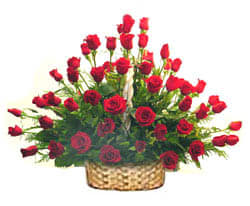 Basket arrangement of red roses