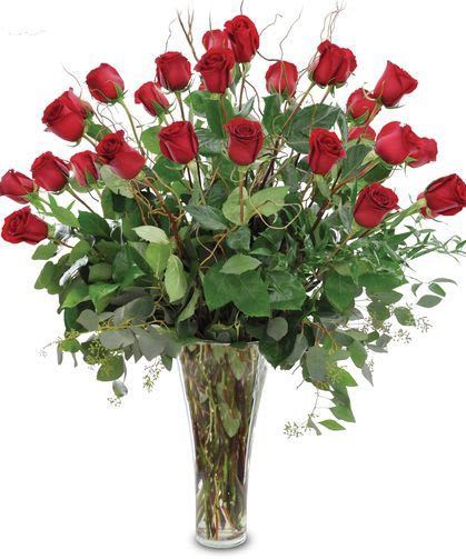 Tall vase arrangement of red roses with greenery