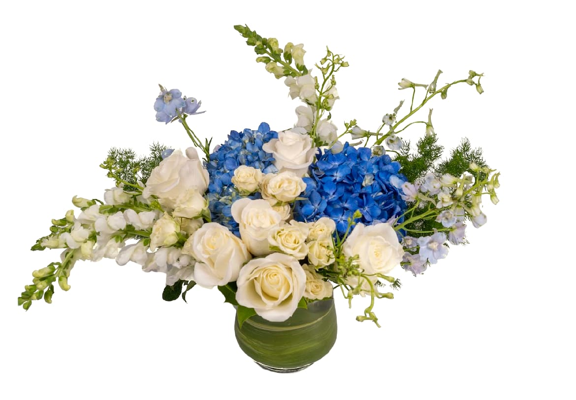 Blue hydrangeas and white roses in a green vase