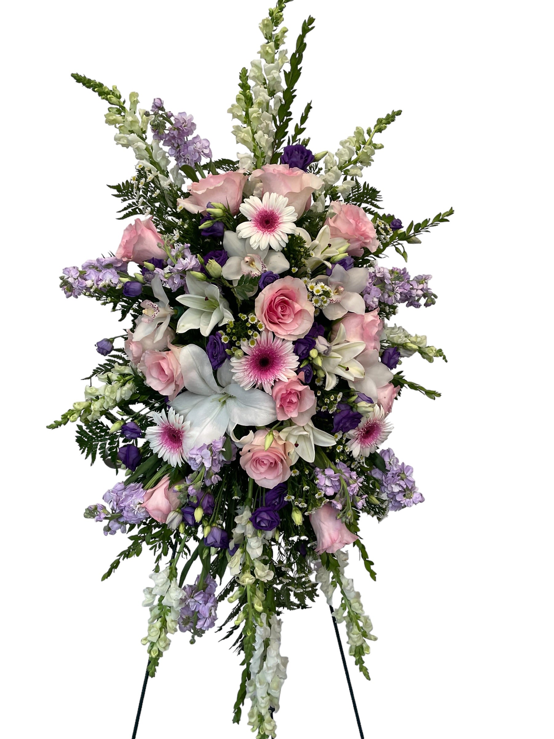 Standing floral spray with pink, white, and purple flowers