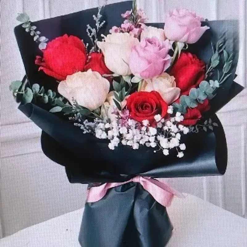 Rainbow Love - 12 mixed roses in a vase wrapped in luxury paper.  some colours may vary.