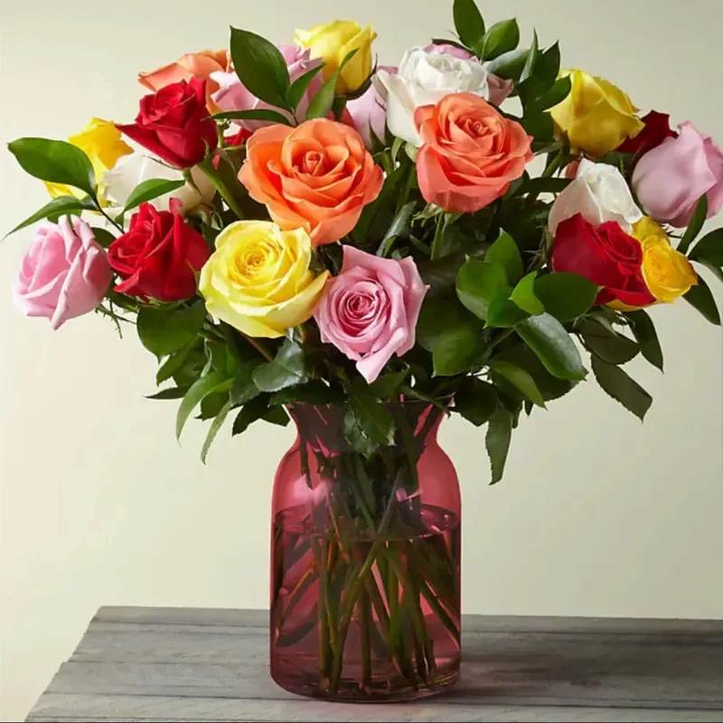 Vibrant Me - 12 mixed coloured fresh roses in a red vase 129.99