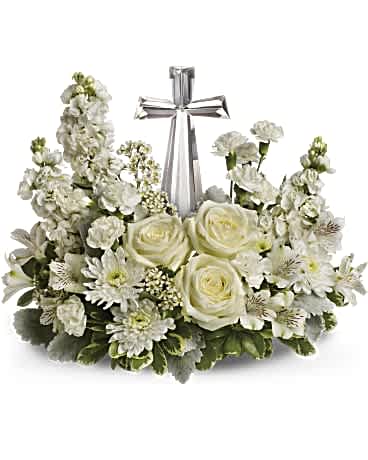 Divine Peace Bouquet - An elegant display of faith and divine peace, this beautiful arrangement will comfort the bereaved in a truly thoughtful and respectful way. An exquisite crystal cross is surrounded by a bed of lovely blossoms. It is sure to be appreciated and always remembered. A fragrant mix of pure white blooms - including roses, alstroemeria, stock, carnations and waxflower - is accented with dusty miller and variegated pittosporum around an exclusive Crystal Cross keepsake.