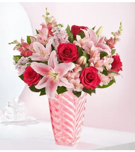 Simply Pink Bouquet - Simply pink. Simply spectacular! Our lovely arrangement is designed in a keepsake vase with a spiral design, celebrating the beauty of Depression era pressed glass. it’s the perfect gift to celebrate and connect with the people you care about.