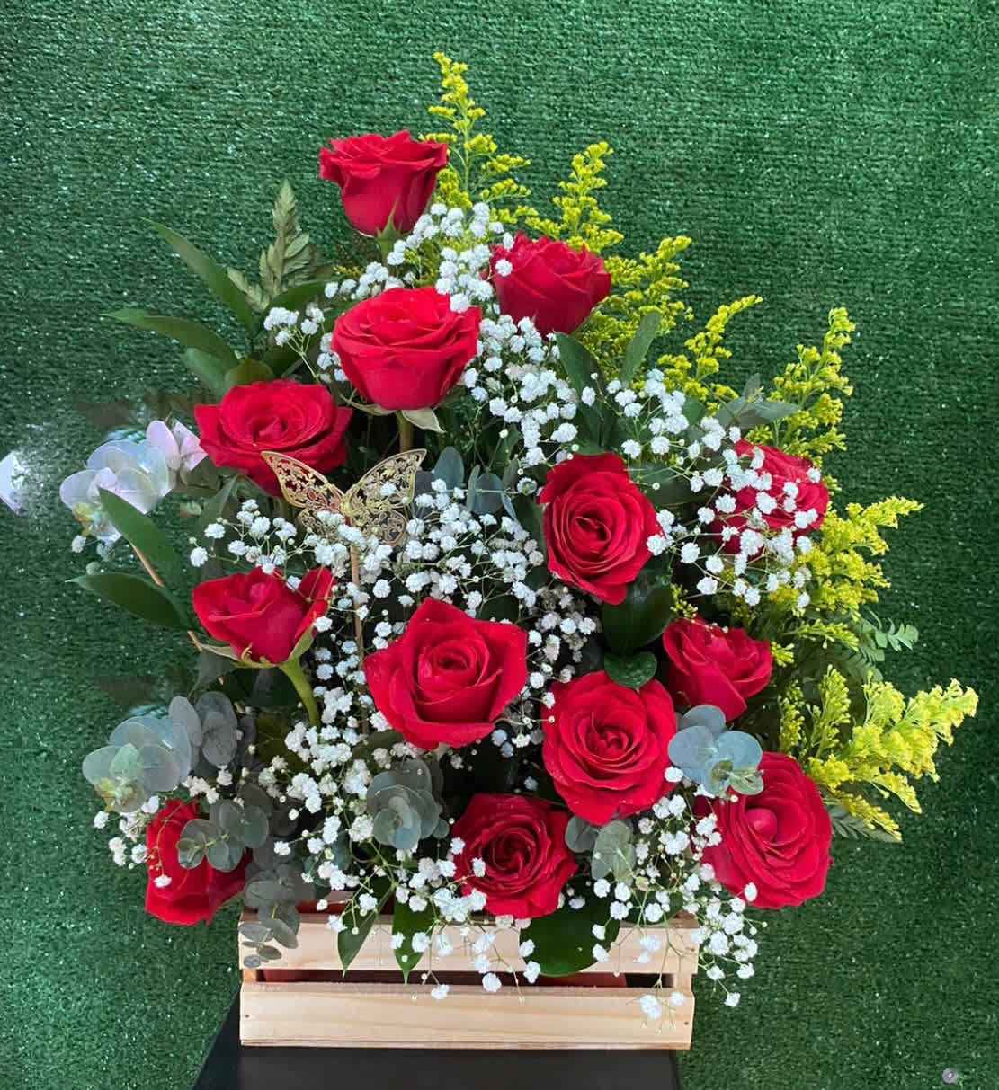Box of 18 Red Roses  -  18 Red Roses in a wood box with Eucalyptus, Solidago and Baby Breath Accents and Butterfly,