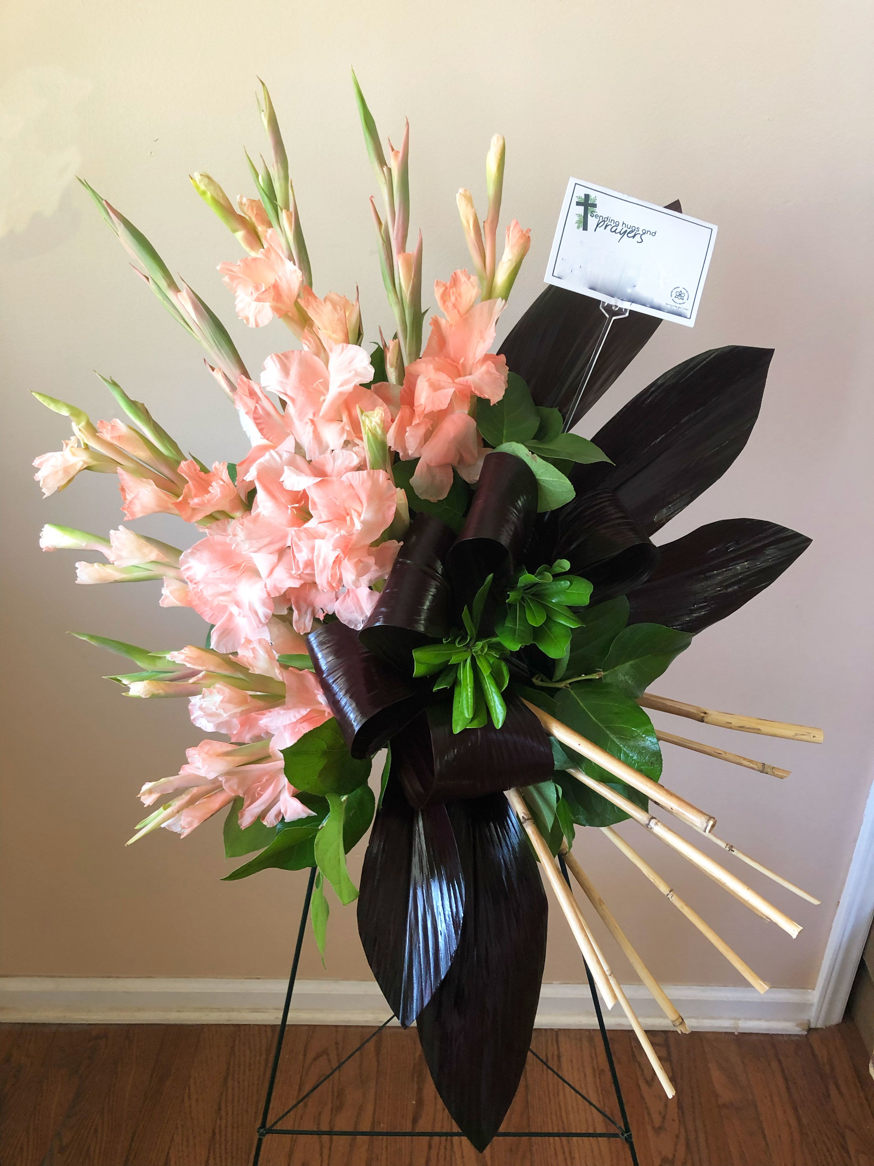 Elegant Tribute Spray - SUBSTITUTION POLICY – Always deliver the freshest flowers! Please note the bouquet pictured reflects our original design.  If the exact flowers or container in this arrangement are not available, our local florists will create a beautiful bouquet with the freshest available flowers.