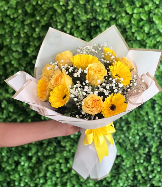 Sunshine Bliss Bouquet - 6 Yellow Gerberas and 6 Yellow Roses in a Wrapped Bouquet with Accents of Baby Breath. 