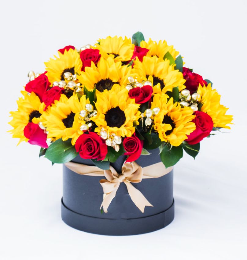 Luxury Box of Sunflowers and Roses - Box of 12 Sunflowers and 18 Red Roses with Gold Berries and Greeneries in a Black Beautiful Box. Bouquet will be delivered approximately as pictured.
