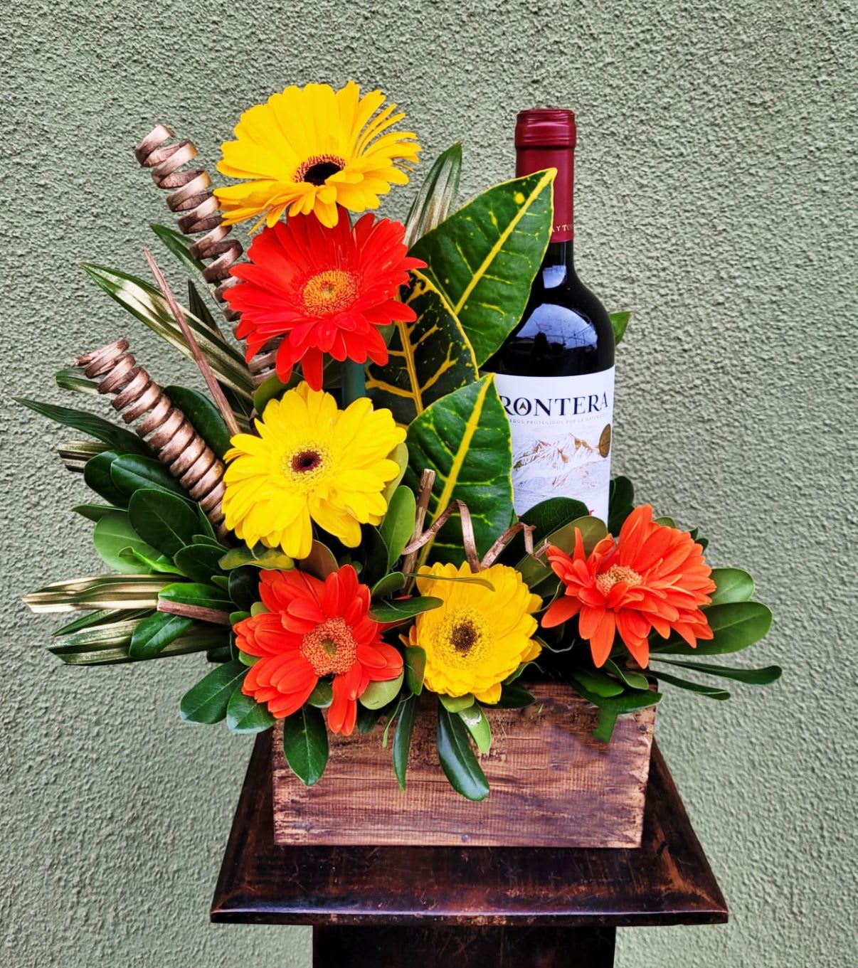 Box of Gerberas  - 6 Gerberas Daises Orange and Yellow. INCLUDES: Frontera Cabernet Sauvignon/Merlot Red Wine.   Bouquet will be delivered approximately as pictured. 