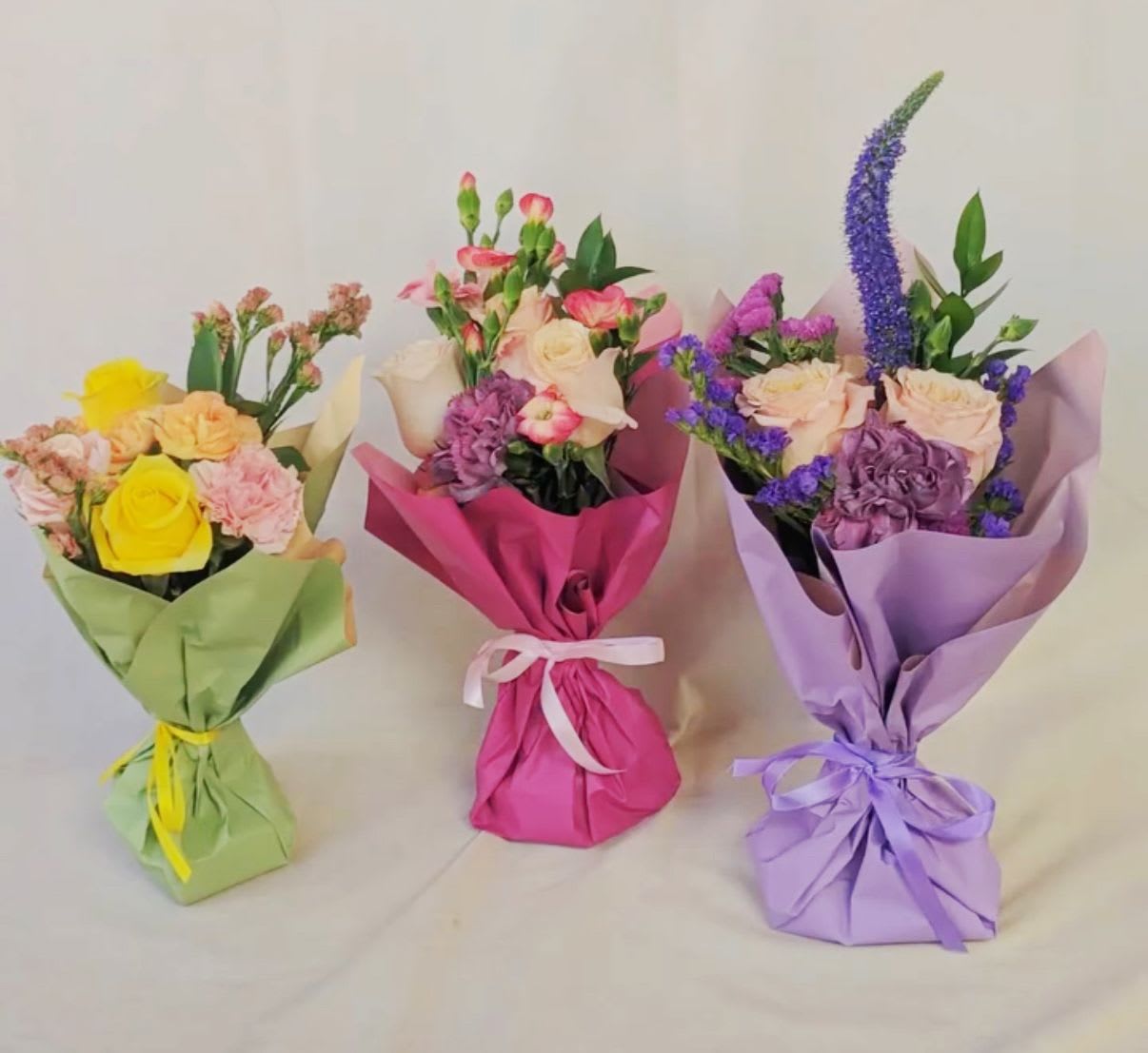 Springful Small Wrapped  - A small gift, perfect for special occasion. Vase with a few flowers, wrapped with paper of your color choice. ***CHOOSE YOUR COLORS, WE CHOOSE THE FLOWERS***