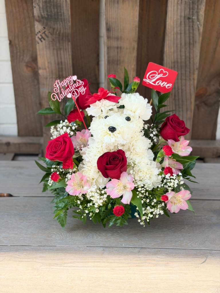 White teddy bear floral arrangement with red roses and pink flowers