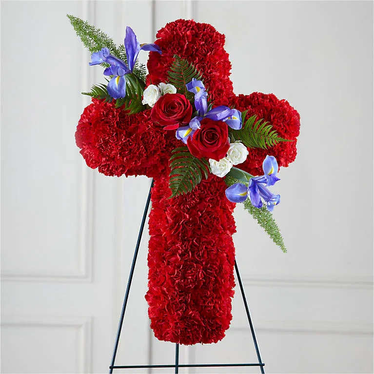 Crimson Tribute Cross Funeral Cross Houston Same Day Flower Delivery - Bold red sympathy cross featuring fresh carnations, roses, and accent blooms, designed to express love, strength, and remembrance. This funeral cross arrangement is handcrafted for services and memorials and delivered with care. Available for same day funeral flower delivery in Houston and surrounding areas.