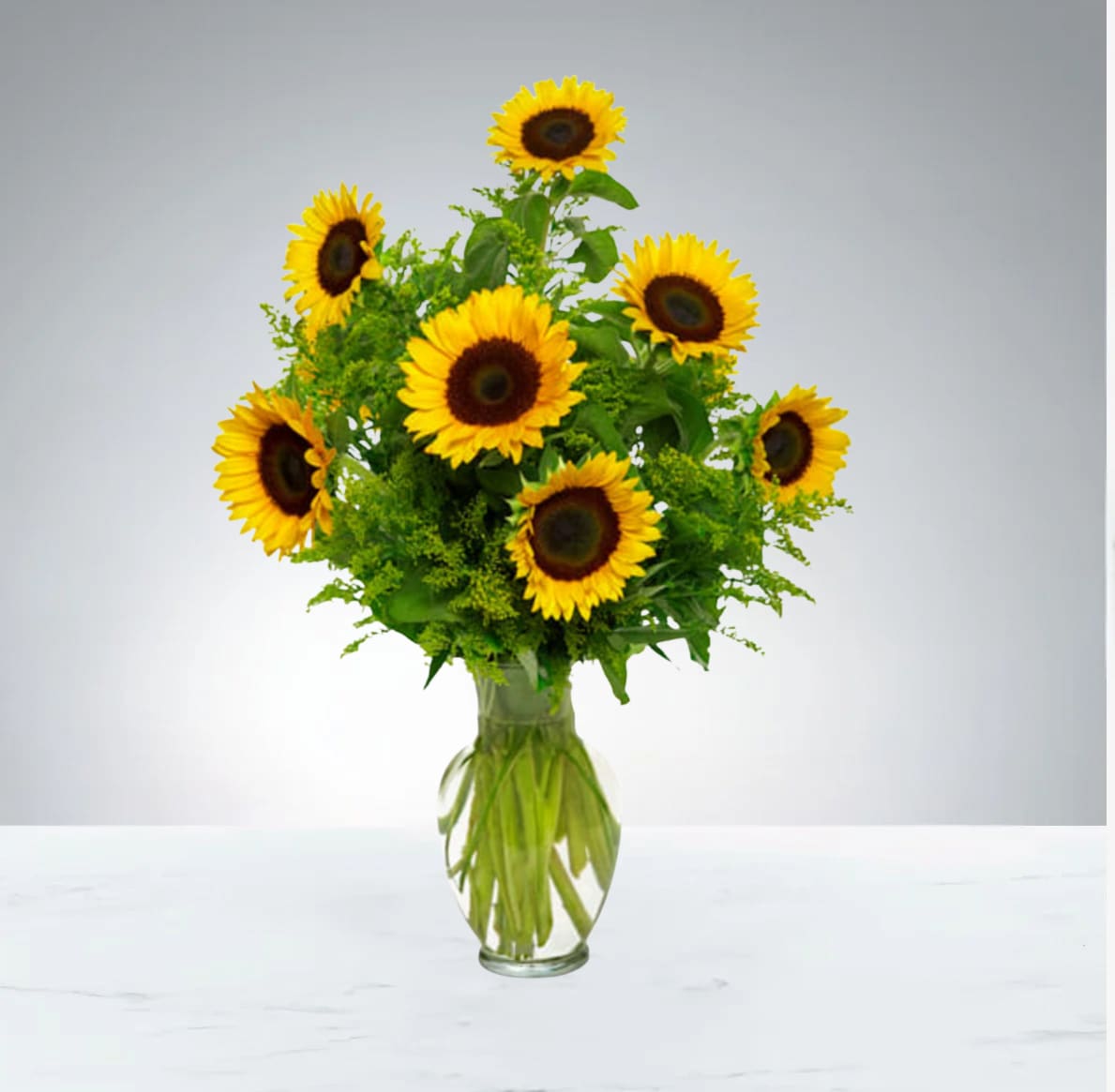 Bouquet of sunflowers in a clear glass vase