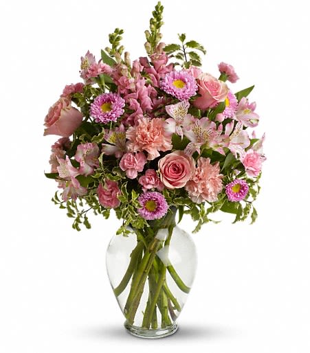 Pink mixed bouquet in a clear glass vase