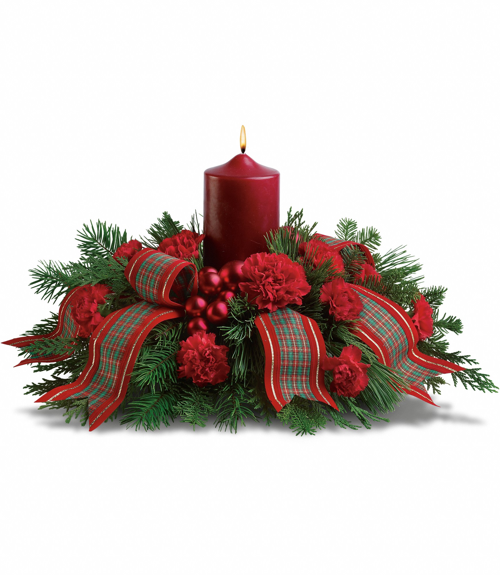 Plaid Celebration - This beautiful arrangement is the perfect way to celebrate the holidays with friends and family. If you're invited to a gathering, send it a couple of days in advance. If you can't actually be there in person, your presence will be felt when you send this lovely present.  Festive red carnations, shiny ornament balls, winter greens, an elegant pillar candle and red taffeta ribbon make this a charming celebration of the season.  Approximately 17" W x 10" H  Orientation: All-Around  As Shown : T123-1A Deluxe : T123-1B Premium : T123-1C