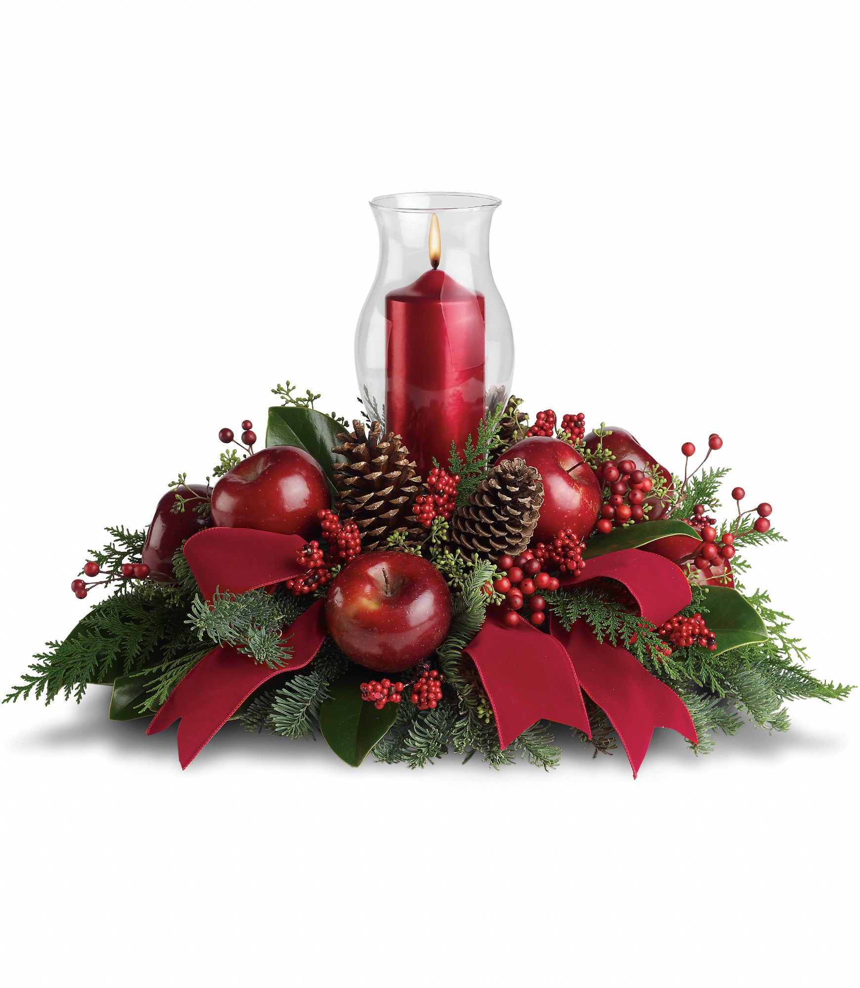 Merry Magnificence  - Shiny red apples make this centerpiece a very tasteful gift. The beautiful hurricane glass and ruby red pillar candle complete the stylish arrangement!    Brilliant red berries and apples are delivered with an elegant hurricane candle, pinecones, winter greens and a stunning red velvet ribbon. It brings a lot of elegance to the table!    Approximately 23" W x 15 1/2" H    Orientation: All-Around        As Shown : T121-1A      Deluxe : T121-1B      Premium : T121-1C    