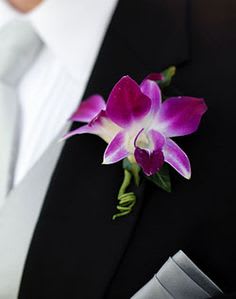 Purple Orchid Boutonniere - Simple orchid boutonniere that will add class to any suit.