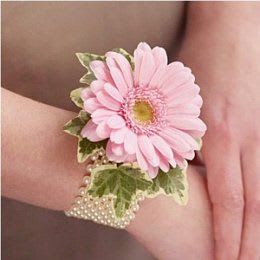 Gerbera Corsage - A simple and elegant gerbera daisy corsage on a beautifully pearled bracelet.  