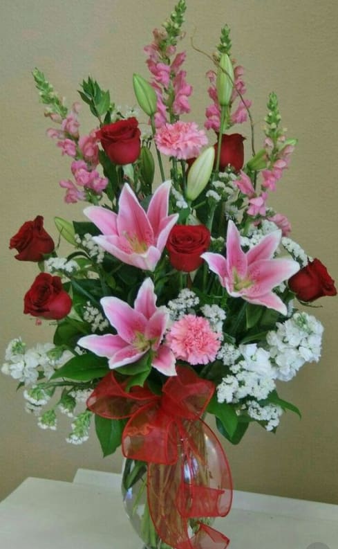 Love Eternal - Fill up her senses with this classic expression of love in red, white and pink with fragrant lilies.