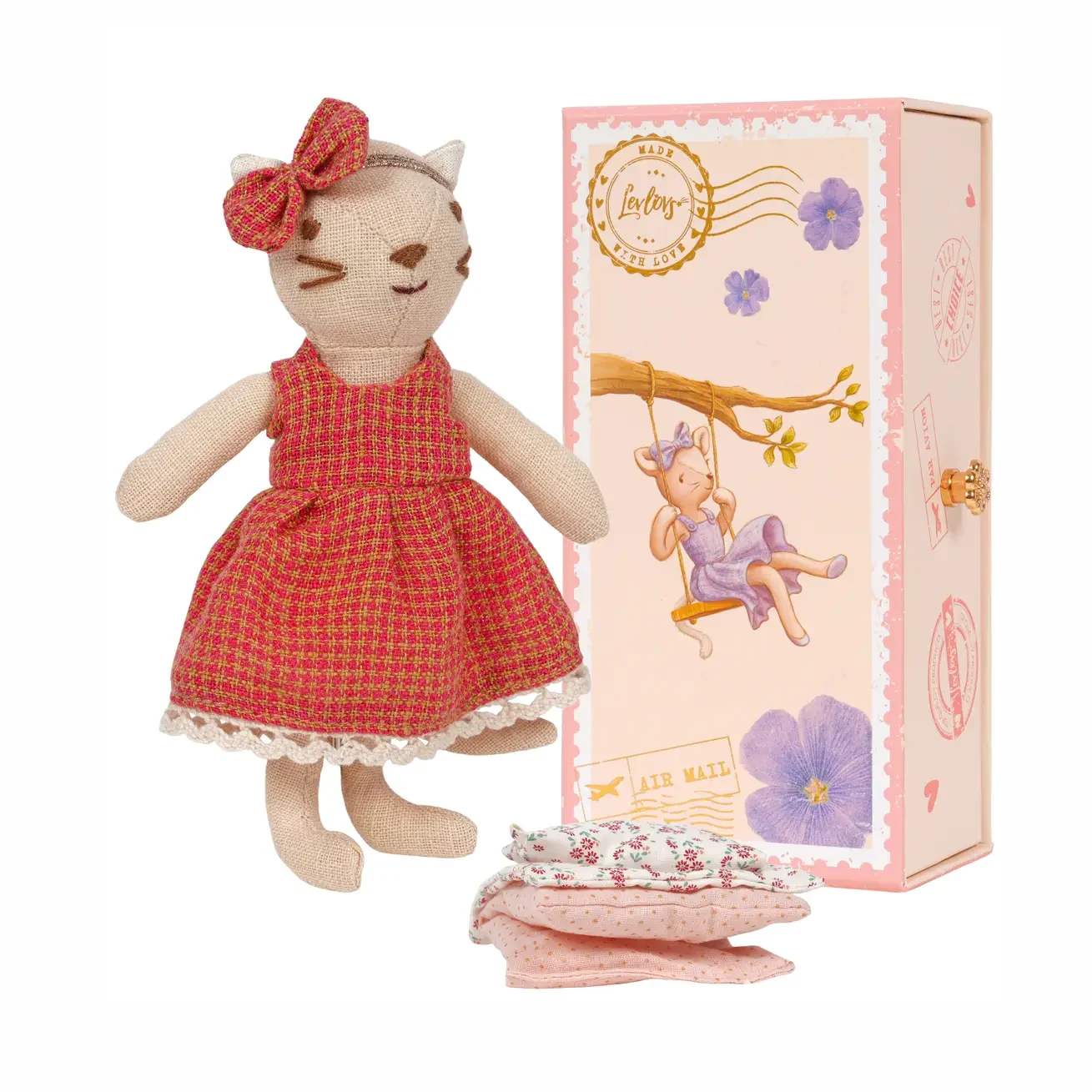 LEVLOVS Cat in Stamp Holder Box - Meet the Levlovs Cat — a gentle-hearted traveler stitched from dreams and soft linen. Dressed in a textured warm red dress with delicate lace trim and a matching bow, this whimsical kitty is ready to drift through storybook skies and quiet, cozy moments.  She arrives nestled in a vintage-inspired keepsake box, designed like a charming air mail letter—adorned with soft florals, postage details, and a dreamy swing scene. Inside, a set of delicate bedding awaits, perfect for little naps between imaginary journeys.  Includes:  1 Levlovs Cat in woven red dress  Soft floral bedding for napping and daydreaming  Keepsake air mail–inspired box  Perfect for: Little dreamers, quiet afternoons, and heartfelt gifts sent with love   Because love, like letters, travels far and soft.