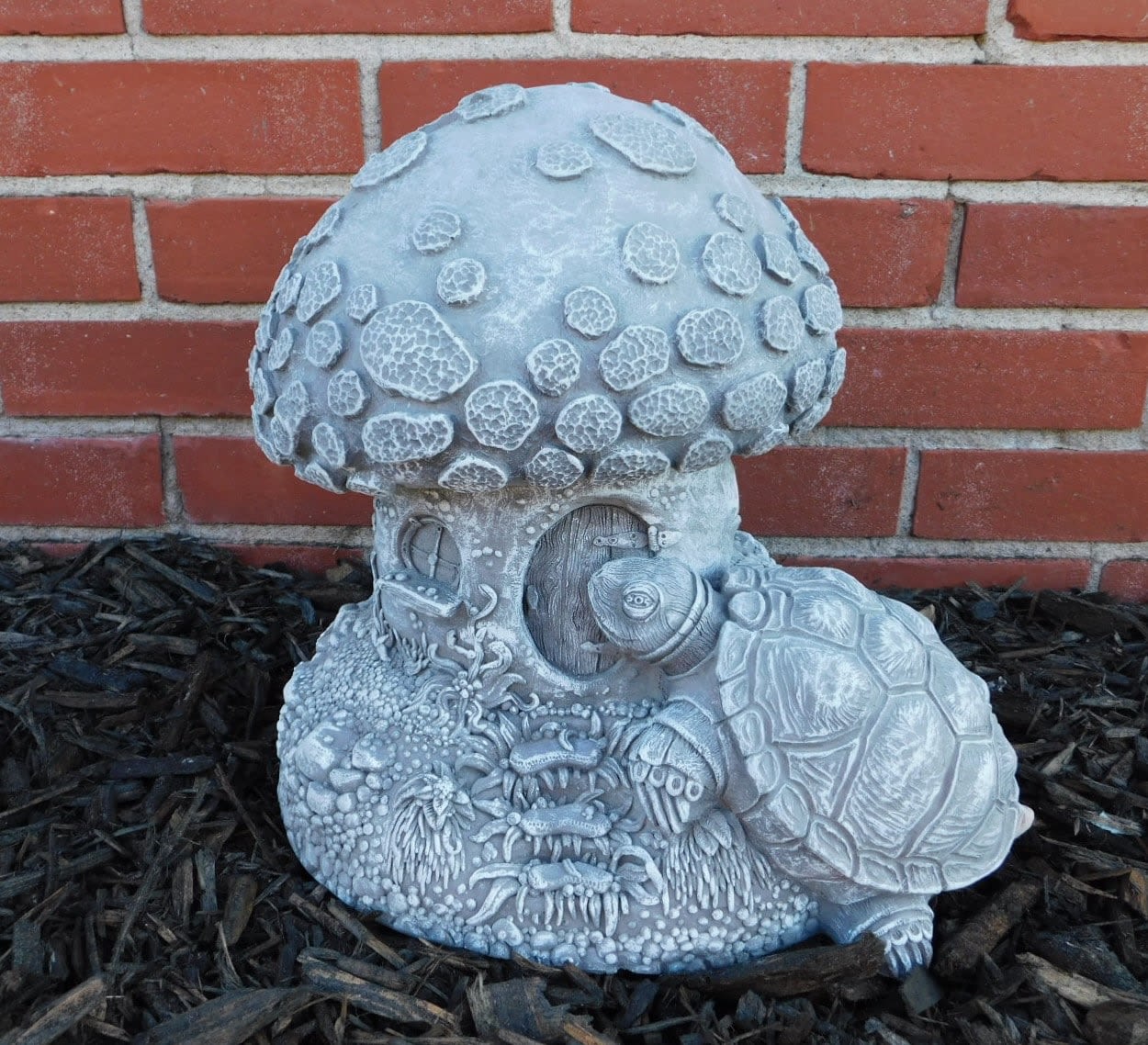 MUSHROOM WITH TURTLE STATUE - An adorable turtle that sits upon a mushroom house. Perfect for adding whimsy to a garden or yard