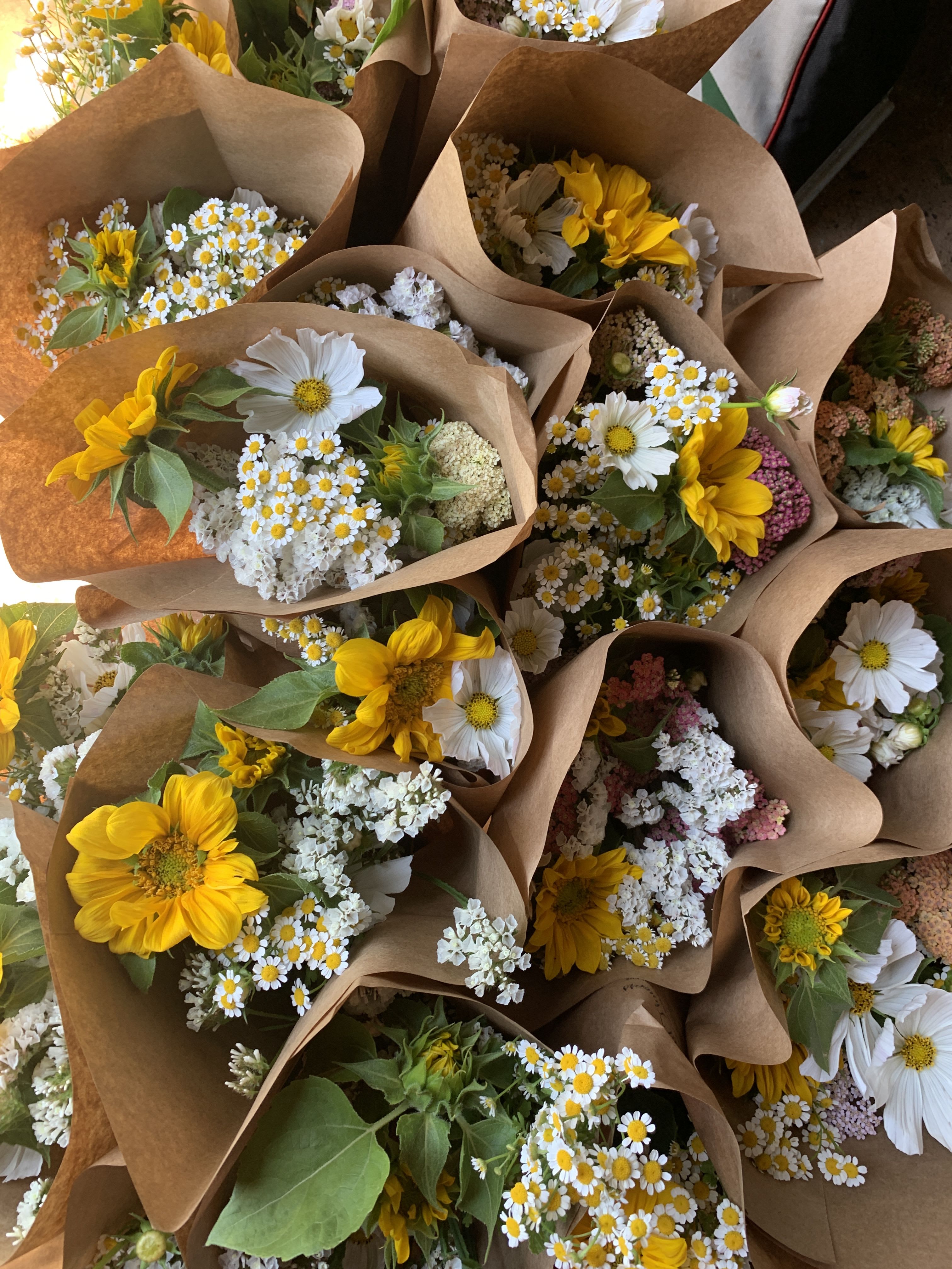 Cafe Seasonal Mix - NOTE: This seasonal wrapped bouquet is available for pick up at the Exchange Cafe in Barboursville.  Availability for pick up are Wednesdays - Sundays during the Exchange's regular business hours ONLY.