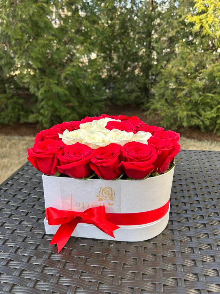 Burning Love  - Burning Love are elegant heart boxes that make them perfect for showing how much you love that special person in your life. Send love!  All Occasion  Place your Order Online Monday to Saturday before 1:00 p.m. (E.T.) for same-day delivery.  “Orders received after hours will be delivered the next business day”. Check our coverage area. Occasionally, substitutions of flowers and/or containers happen due to weather, seasonality, and market conditions, which may affect availability. If this is the case with the gift you’ve selected, we will ensure that your arrangement's style, theme, and color scheme are preserved and will only substitute items of equal value or higher value.  CARE INSTRUCTIONS Gently mist the arrangement with natural water every other day. Do not spray any cleaning product on the flower arrangement. Do not place heavy objects directly on the flower arrangement. Keep them out of direct sunlight and extreme heat. 