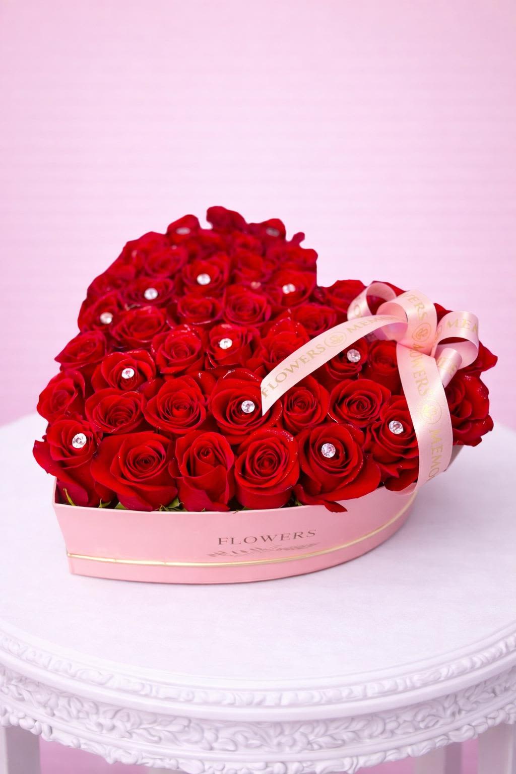 Love Heart Box - Medium size heart includes 2 Dz red roses.   (Medium size heart) Box color may vary. 