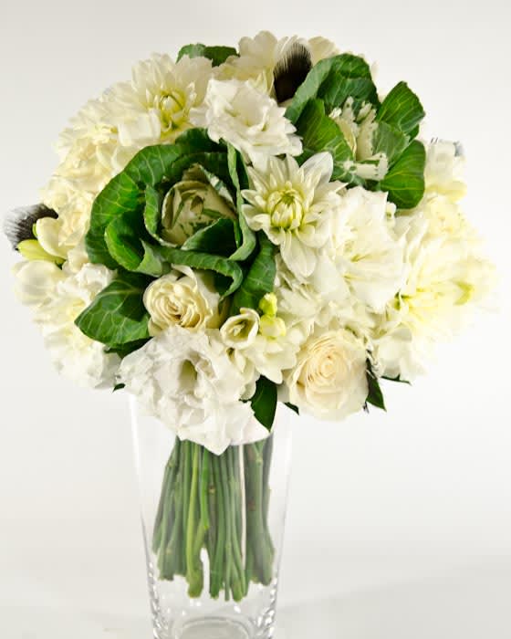 White floral bouquet in a clear glass vase
