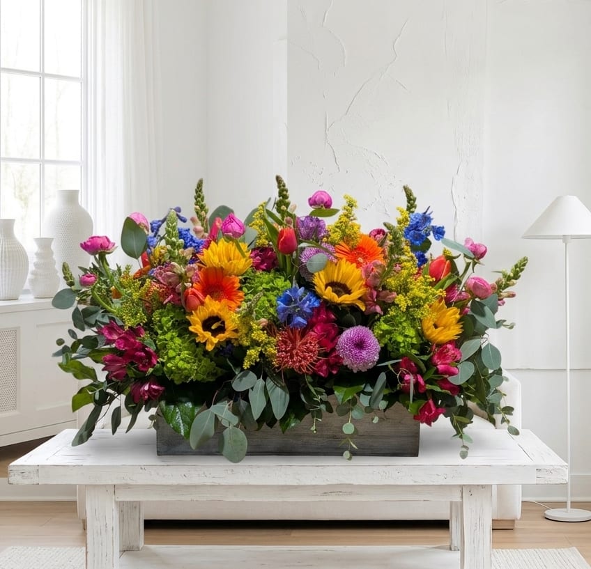 Box of Spring - A mixture of seasonal spring flowers design in a long rectangle box. ** Measurement 26" long by 14" tall.