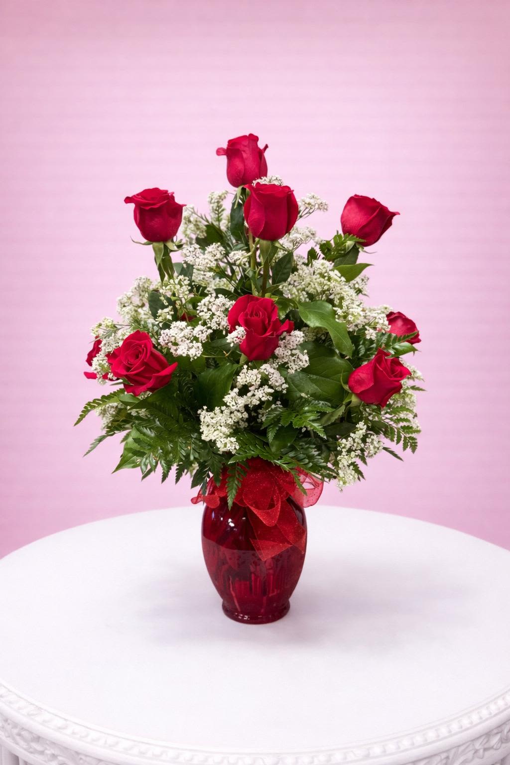 One Dz Red Roses - One Dz Red Roses in glass vase filled with greenery and baby breath. Its a classic, unforgettable and beautiful piece. A must have ! 
