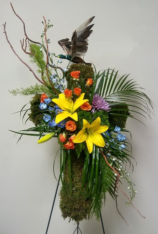 The Outdoorsman Cross - This rugged sympathy cross represents the outdoorsmans love of nature and makes a fitting tribute to them hunting and fishing. 