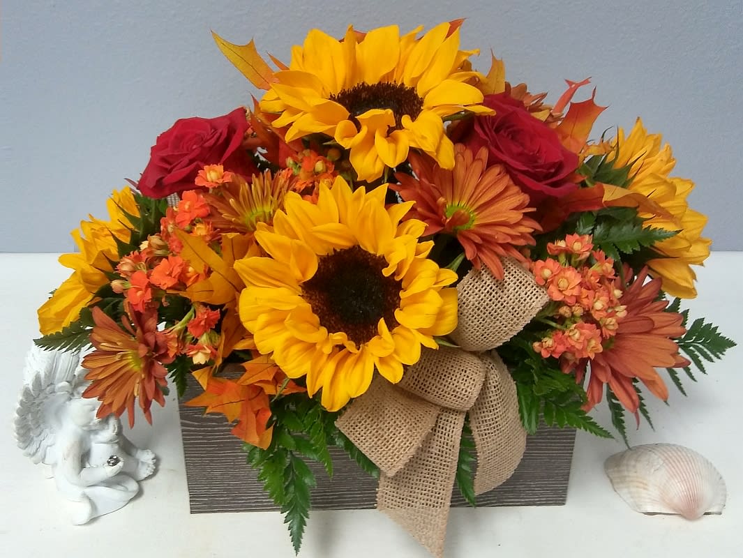 Sunflower and rose arrangement in a rectangular box with burlap ribbon