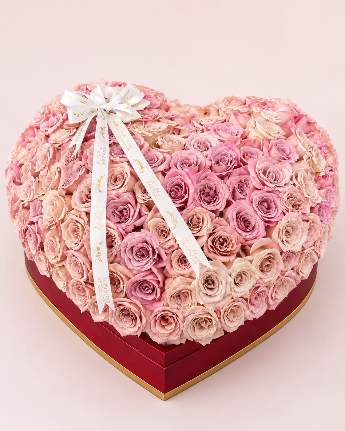 150 Roses- XLarge Heart Luxe Box - A breathtaking statement of love and elegance, our Large Heart Luxe Box is designed with approximately 150 premium Ecuadorian roses. Carefully arranged in our luxurious oversized heart-shaped box, this 3D design creates a full, lush, and unforgettable presentation.  Finished with our signature satin ribbon bow, this arrangement is perfect for anniversaries, birthdays, proposals, Valentine’s Day, Mother’s Day, or any moment worth celebrating in a grand way.   Includes approximately 150 premium Ecuadorian roses  Luxury oversized heart-shaped keepsake box  Handcrafted with premium fresh blooms  Designed for an elegant, romantic presentation  A timeless floral piece that speaks the language of love beautifully.  ** Colors of roses can be customized upon request. ** Box Available in Black, Pink, and White